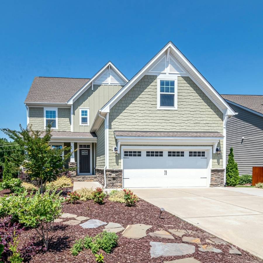beautiful house with white agrage door
